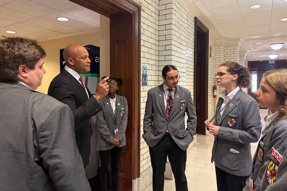 Governor Wes Moore speaks to a group of Student Pages
