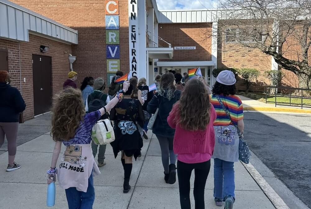 A group of students enter Carver Educational Services Center to attend the MCPS GSA Summit