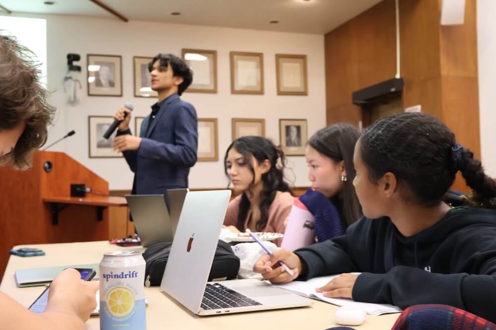 2024-25 SMOB Praneel Suvarna speaks to a group of students in his SMOB Advisory Council