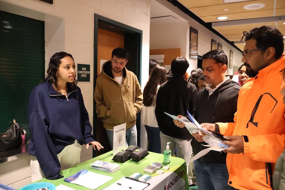 Families hear from a community organization